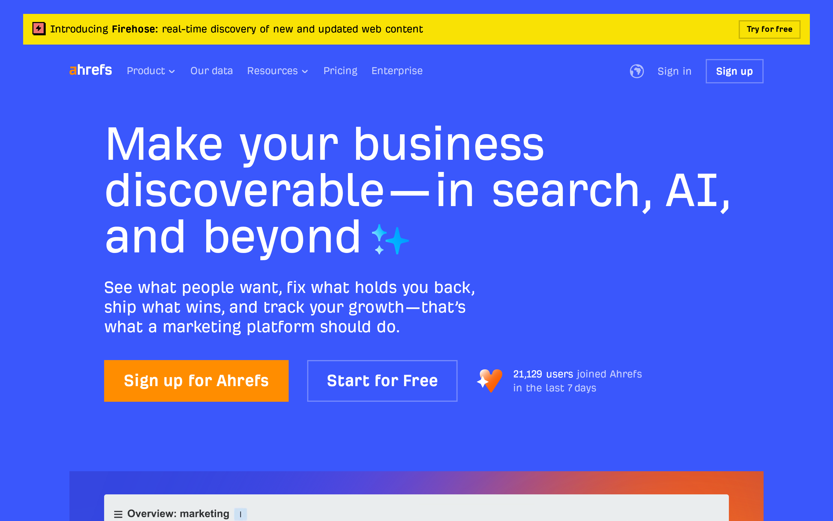 Ahrefs homepage hero with the headline 'Make your business discoverable—in search, AI, and beyond'